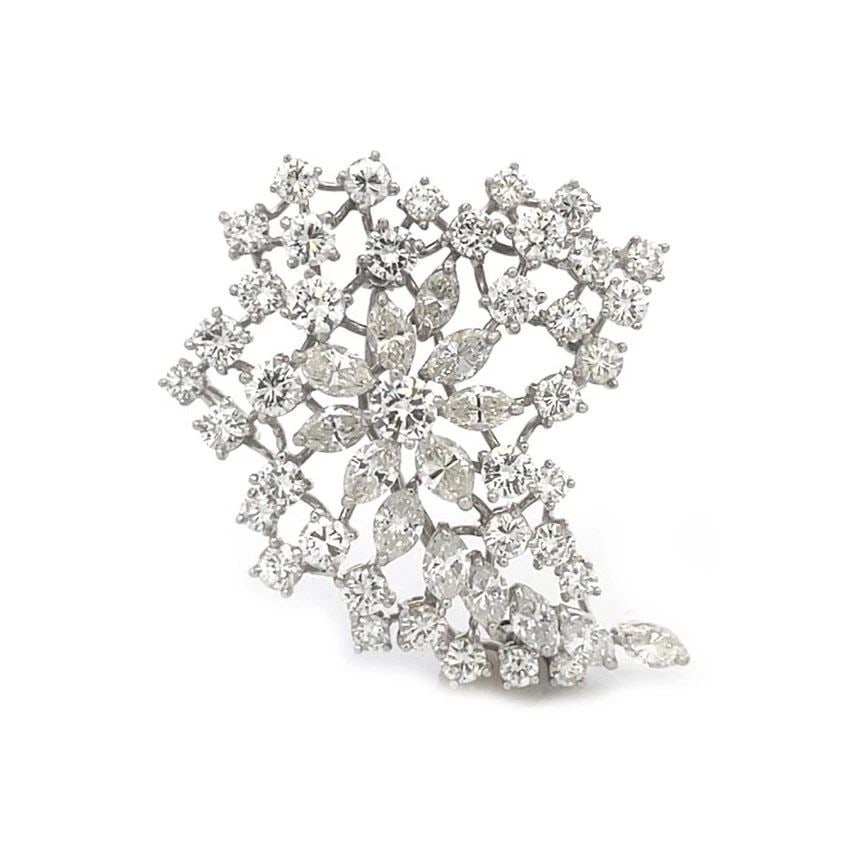 PLATINUM GOLD 7.5CT DIAMOND FLORAL SPRAY BROOCH/PENDANT: PLATINUM GOLD 7.5CT DIAMOND FLORAL SPRAY BROOCH/PENDANT PLATINUM GOLD 7.5CT DIAMOND FLORAL SPRAY BROOCH/PENDANT This is a magnificent platinum spray shape frame in a wide to a small, curved shape,