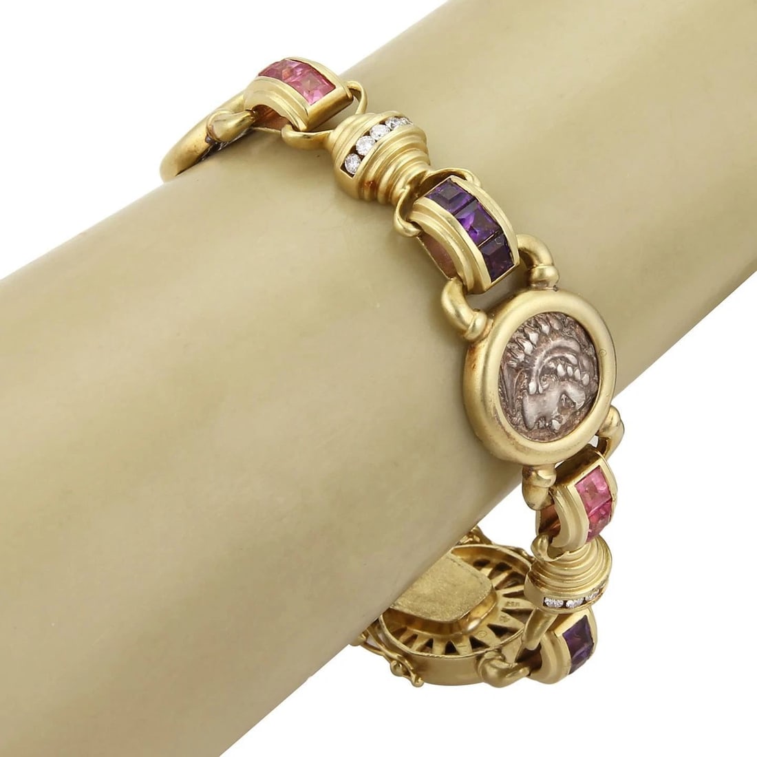 DIAMOND GOLD COIN BRACELET 18K YELLOW WITH MULTI GEMS: DIAMOND GOLD COIN BRACELET 18K YELLOW WITH MULTI GEMS DIAMOND GOLD COIN BRACELET 18K YELLOW WITH MULTI GEMS Diamond Multicolor Gems 18k Yellow Gold Silver Coin Fancy Bracelet Description This fabulous