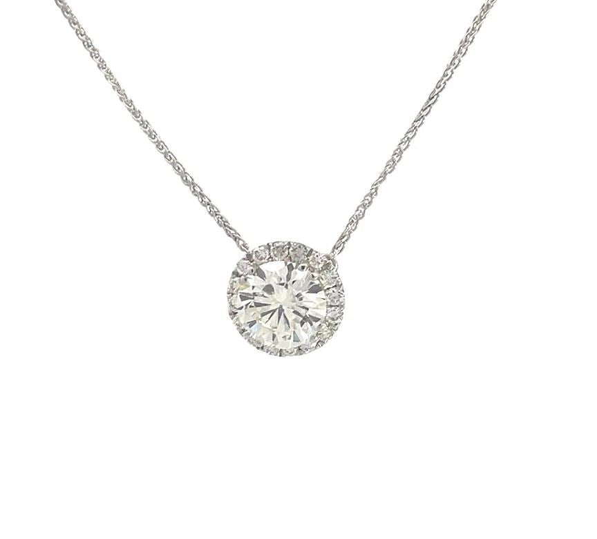 DIAMOND HALO GOLD PENDANT 2.15CT 14K WHITE CHAIN NECKLACE: DIAMOND HALO GOLD PENDANT 2.15CT 14K WHITE CHAIN NECKLACE DIAMOND HALO GOLD PENDANT 2.15CT 14K WHITE CHAIN NECKLACE This stunning pendant and chain necklace is crafted from 14k white gold with a polis