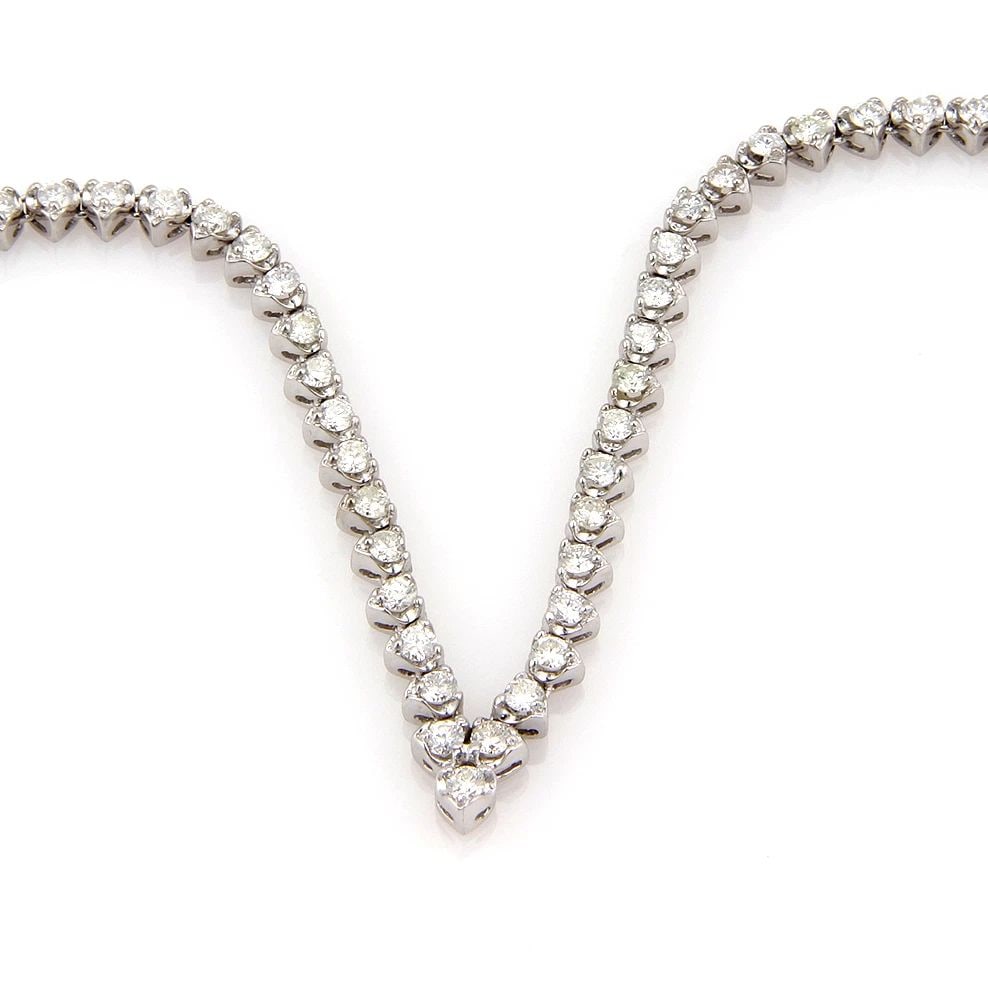 DIAMOND GOLD TENNIS NECKLACE 7.95CT 14K WHITE V SHAPE HEART LINK PRONG SET STYLE: DIAMOND GOLD TENNIS NECKLACE 7.95CT 14K WHITE V SHAPE HEART LINK PRONG SET STYLE This Diamond Gold Tennis Necklace features a stunning V-shape design with heart links, showcasing natural white diamond