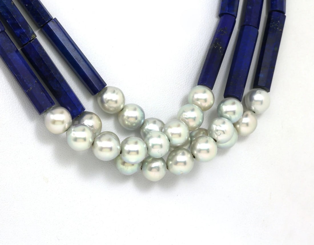 LAPIS PEARLS GOLD NECKLACE 22K TRIPLE STRAND TUBE STYLE STRING: LAPIS PEARLS GOLD NECKLACE 22K TRIPLE STRAND TUBE STYLE STRING This Lapis Pearls Gold Necklace features a triple strand tube style string with blue lapis bars and yellow gold accents on each strand. T