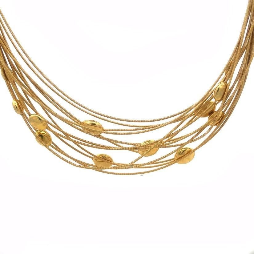MARCO BICEGO SIVIGLIA GOLD NECKLACE BEAD MOTIFS 18K YELLOW MULTISTRAND COLLAR: MARCO BICEGO SIVIGLIA GOLD NECKLACE BEAD MOTIFS 18K YELLOW MULTISTRAND COLLAR This is a beautiful eye-catching multi-strand cable necklace by Marco Bicego from his Siviglia Collection; it is crafted f