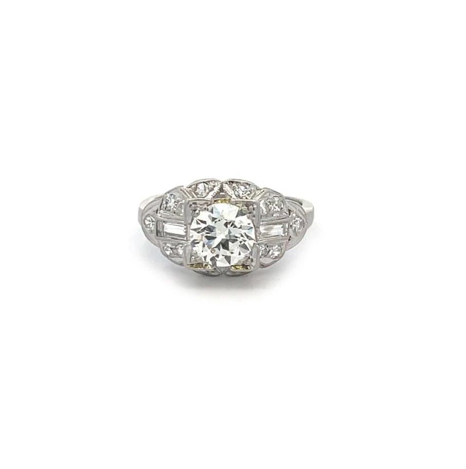 DIAMOND PLATINUM RING MILGRAIN FLORAL SIZE 4.75 ART DECO: DIAMOND PLATINUM RING MILGRAIN FLORAL SIZE 4.75 ART DECO This Diamond Platinum Ring in size 4.75 features a beautiful round white diamond set in a prong setting with a platinum base metal. The Art Dec
