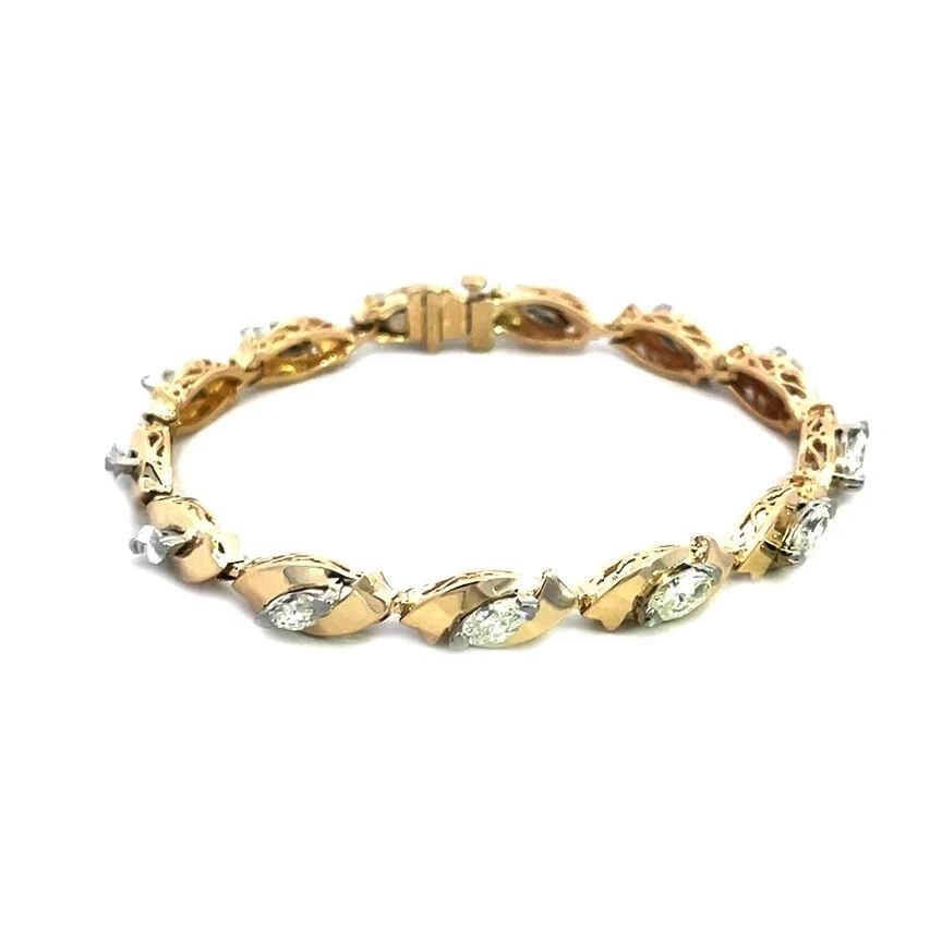 MARQUISE DIAMOND GOLD BRACELET 14K YELLOW MARQUISE LINK STYLE: MARQUISE DIAMOND GOLD BRACELET 14K YELLOW MARQUISE LINK STYLE Add a touch of luxury to your jewelry collection with this unique style bracelet, crafted from 14k yellow gold, this stunning piece of jew