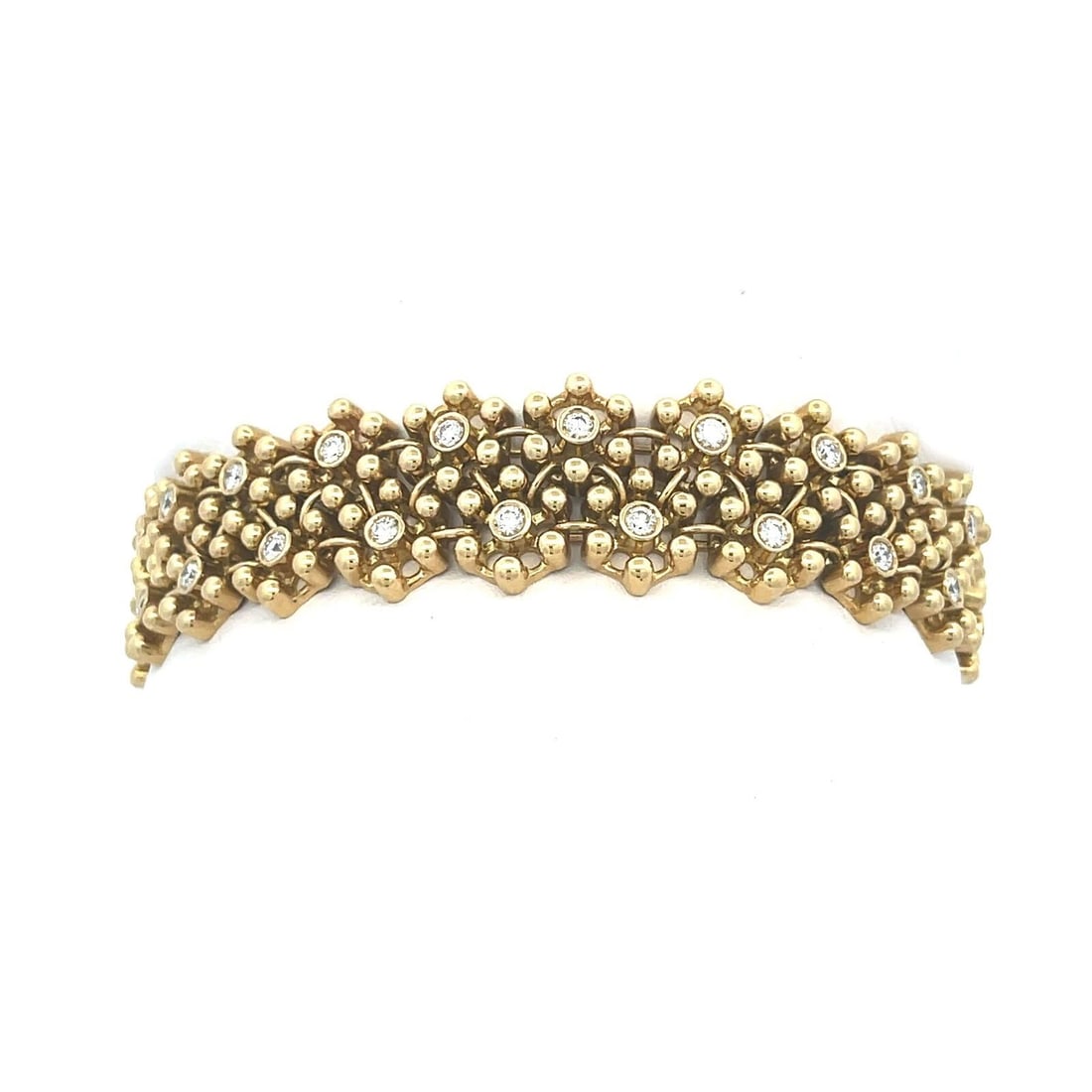 DIAMOND FLORAL BEAD BRACELET IN 18K YELLOW GOLD WIDE FLEX STYLE: DIAMOND FLORAL BEAD BRACELET IN 18K YELLOW GOLD WIDE FLEX STYLE DIAMOND FLORAL BEAD BRACELET IN 18K YELLOW GOLD WIDE FLEX STYLE This lovely bracelet is crafted from 18k yellow gold featuring double ro