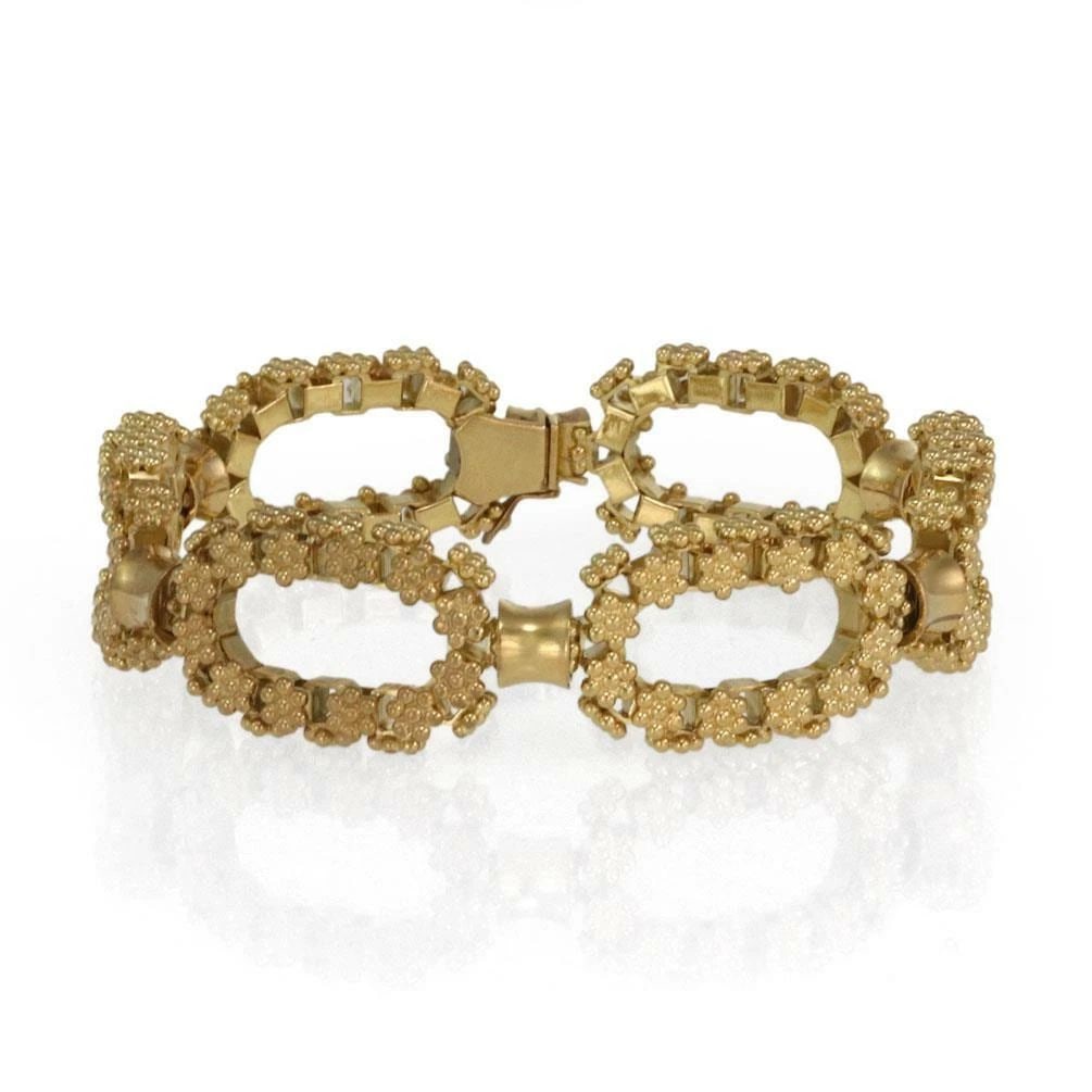 ETRUSCAN FLORAL DESIGN 18K YELLOW GOLD OPEN OVAL LINK BRACELET: ETRUSCAN FLORAL DESIGN 18K YELLOW GOLD OPEN OVAL LINK BRACELET ETRUSCAN FLORAL DESIGN 18K YELLOW GOLD OPEN OVAL LINK BRACELET Etruscan Floral Design 18k Yellow Gold Open Oval Link Bracelet Description