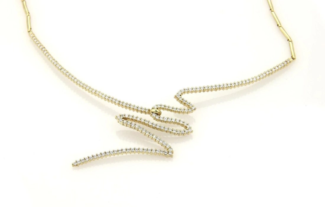 JOSE HESS DIAMONDS GOLD NECKLACE 14K YELLOW ZIG ZAG STYLE CENTERPIECE: JOSE HESS DIAMONDS GOLD NECKLACE 14K YELLOW ZIG ZAG STYLE CENTERPIECE The Jose Hess Diamonds Gold Necklace features a stunning zigzag style (lightening flash) centerpiece set with natural white diamon