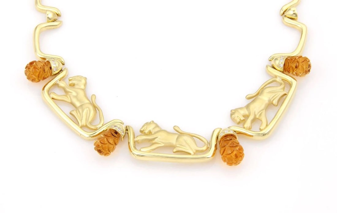 DIAMOND GOLD LEOPARD NECKLACE CITRINE 18K YELLOW FANCY COLLAR STYLE: DIAMOND GOLD LEOPARD NECKLACE CITRINE 18K YELLOW FANCY COLLAR STYLE This is a luxurious 18k yellow gold collar necklace, it features three playful leopards set on a long bar like link open with a citr
