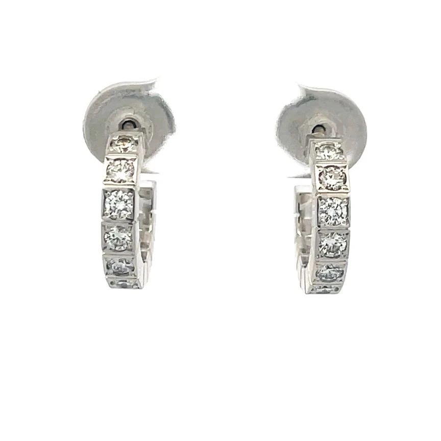 CARTIER LANIERES DIAMOND EARRINGS 18K WHITE GOLD MINI HOOPS POUCH PAPER: CARTIER LANIERES DIAMOND EARRINGS 18K WHITE GOLD MINI HOOPS POUCH PAPER The Cartier Lanieres Diamond Earrings are a stunning pair of 18k white gold mini hoops featuring natural white diamonds set in e