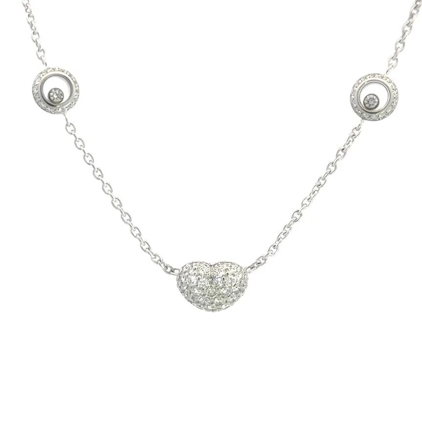 CHOPARD HAPPY DIAMOND GOLD NECKLACE 18K WHITE PAVE SET PUFF HEART BOX: CHOPARD HAPPY DIAMOND GOLD NECKLACE 18K WHITE PAVE SET PUFF HEART BOX This magnificent necklace is by Chopard from the Happy Diamond Collection. It is an elegant and luxurious piece of fine jewelry fe
