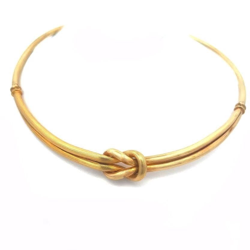 ILIAS LALAOUNIS GOLD CHOKER NECKLACE 18K YELLOW LOVE KNOT: ILIAS LALAOUNIS GOLD CHOKER NECKLACE 18K YELLOW LOVE KNOT ILIAS LALAOUNIS GOLD CHOKER NECKLACE 18K YELLOW LOVE KNOT This authentic choker necklace is by Ilias Lalaounis, it is crafted from 18k yellow