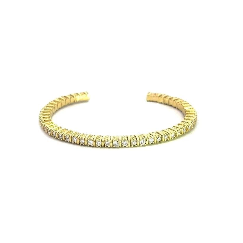 JUDITH RIPKA GOLD DIAMOND CUFF BRACELET 18K YELLOW PRONG SET BEAD ETRUSCAN STYLE: JUDITH RIPKA GOLD DIAMOND CUFF BRACELET 18K YELLOW PRONG SET BEAD ETRUSCAN STYLE Chic and authentic by Judith Ripka, this thin high prong set cuff band is crafted from 18k yellow gold featuring sparkl