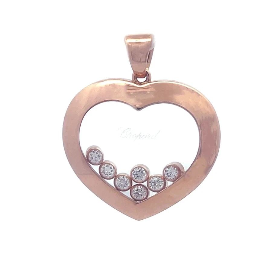 CHOPARD HAPPY DIAMOND GOLD PENDANT 18K ROSE 7 FLOATING HEART SHAPE: CHOPARD HAPPY DIAMOND GOLD PENDANT 18K ROSE 7 FLOATING HEART SHAPE CHOPARD HAPPY DIAMOND GOLD PENDANT 18K ROSE 7 FLOATING HEART SHAPE This charming authentic pendant is by Chopard from the Happy Diamo