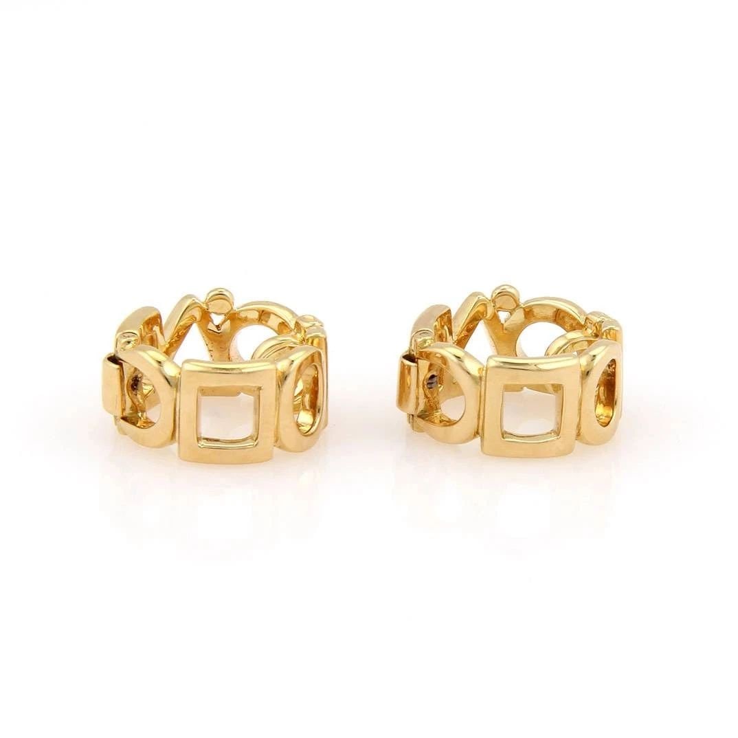CHANEL GOLD HOOP EARRINGS MULTI SHAPE 18K YELLOW GOLD 10MM- NON PIERCED: CHANEL GOLD HOOP EARRINGS MULTI SHAPE 18K YELLOW GOLD 10MM- NON PIERCED These Chanel Gold Hoop Earrings are crafted with 18k yellow gold, making them a luxurious and high-quality accessory. The multi