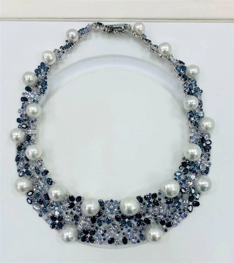 18KT LRG FANCY SOUTH SEA PEARL BLUE SAPPHIRE NECKLACE!: 18KT LRG FANCY SOUTH SEA PEARL BLUE SAPPHIRE NECKLACE! The following Item we are Offering is this Magnificent 18KT Gold Large South Sea Pearl and Multi Color Blue Sapphire and Diamond Necklace. This G