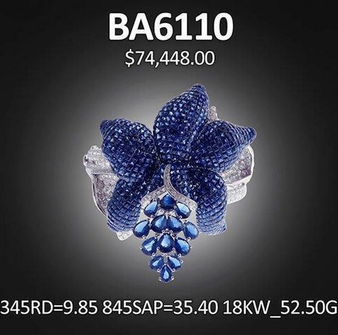 18KT 45CT BLUE SAPPHIRE FLORAL DIAMOND CUFF: 18KT 45CT BLUE SAPPHIRE FLORAL DIAMOND CUFF 18KT 45CT BLUE SAPPHIRE FLORAL DIAMOND CUFF The Following Item we are offering is this Beautiful Rare Important 18KT White Gold Blue Sapphire and Diamond