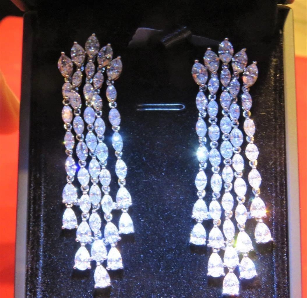 18KT 15CT RARE FANCY GLITTERING DIAMOND DANGLE EARRINGS: 18KT 15CT RARE FANCY GLITTERING DIAMOND DANGLE EARRINGS The Following Item we are offering is a Rare Important Radiant 18KT White Gold Gorgeous Glittering Diamond Earrings. Each Earring Features