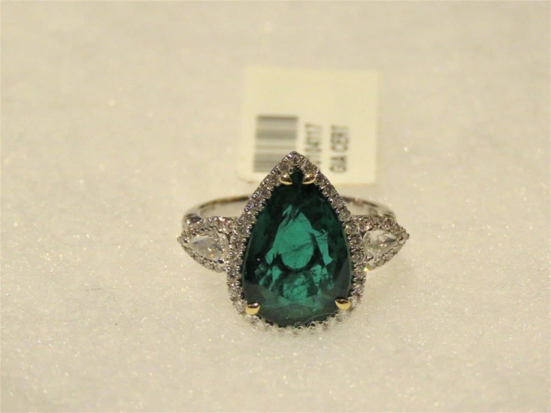 18KT LRG PEAR SHAPED EMERALD DIAMOND RING: 18KT LRG PEAR SHAPED EMERALD DIAMOND RING The Following Item we are offering is this Beautiful 18KT Rare Important Large GIA Certified Emerald and Diamond Ring