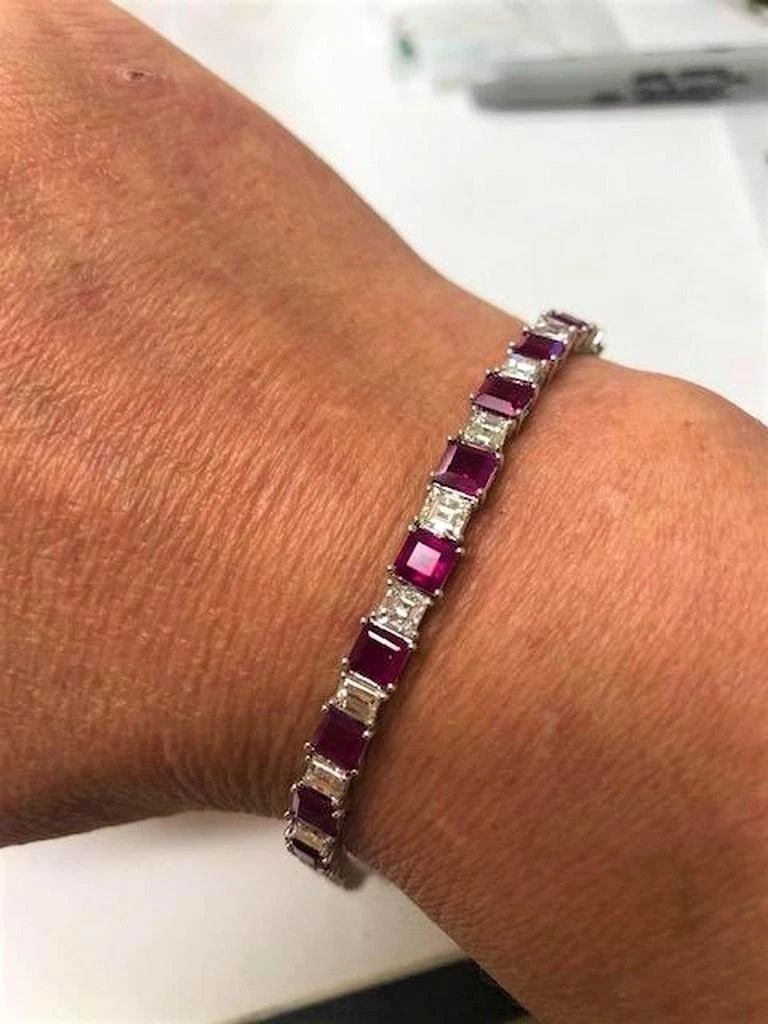18KT GOLD RARE FANCY RUBY BAGUETTE DIAMOND BRACELET: 18KT GOLD RARE FANCY RUBY BAGUETTE DIAMOND BRACELET The Following Item we are offering is this Beautiful Rare Important 18KT Gold Sparkling Ruby and Diamond Tennis Bracelet. FEATURING Magnificent Rare