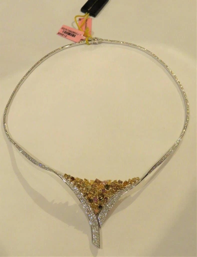 18KT FANCY YELLOW DIAMOND NECKLACE: 18KT FANCY YELLOW DIAMOND NECKLACE The Following Item we are offering is this Beautiful Rare Important 18KT White Gold GIA Certified Brilliant Fancy Yellow Diamond and White Diamond Necklace. Necklace
