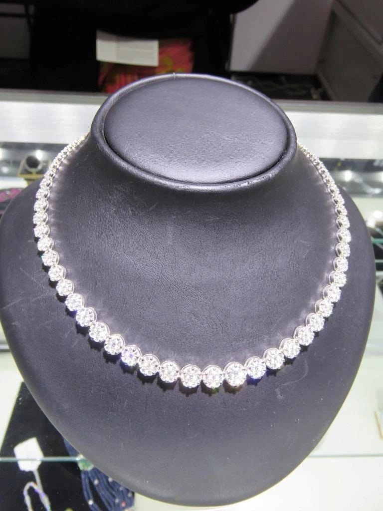 18KT GOLD GORGEOUS 14.50CT FANCY DIAMOND TENNIS NECKLACE: 18KT GOLD GORGEOUS 14.50CT FANCY DIAMOND TENNIS NECKLACE The Following Item we are offering is this Rare Important Radiant 18KT Gold Gorgeous Glittering and Sparkling Magnificent Fancy Diamond Necklac