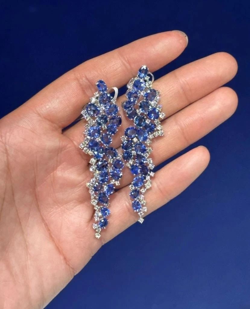 18KT GOLD FANCY LARGE BLUE SAPPHIRE DIAMOND EARRINGS: 18KT GOLD FANCY LARGE BLUE SAPPHIRE DIAMOND EARRINGS The Following Items we are offering are these Extremely Rare Beautiful 18KT Gold Fine Large Blue Sapphire Earrings comprised of approx 30CTS Carats