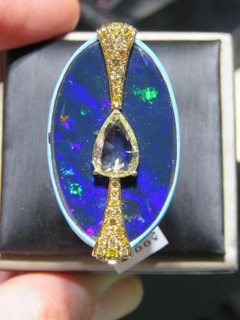 RARE GORGEOUS 18KT BLACK OPAL DIAMOND YELLOW DIAMOND RING: RARE GORGEOUS 18KT BLACK OPAL DIAMOND YELLOW DIAMOND RING RARE GORGEOUS 18KT BLACK OPAL DIAMOND YELLOW DIAMOND RING The Following Item we are offering is a Rare Important Spectacular and Brilliant 18K
