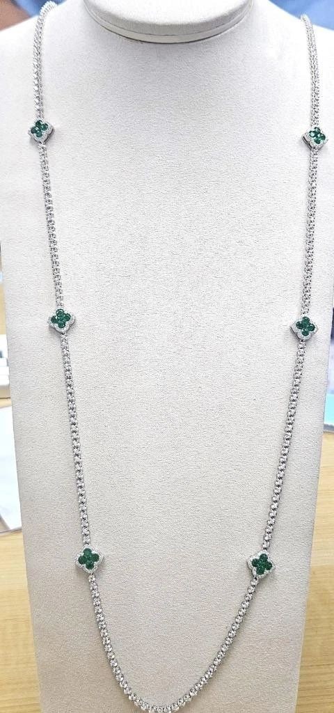 18KT GORGEOUS FANCY CLOVER 9CT EMERALD DIAMOND NECKLACE: 18kt GORGEOUS FANCY CLOVER 9CT EMERALD DIAMOND NECKLACE The Following Item we are offering is A Rare 18KT Gold Fancy Large Emerald Diamond Clover Necklace. Necklace is comprised of Finely Set Glitteri