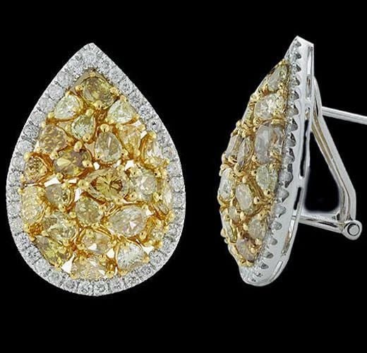 18KT GORGEOUS 6.50CT FANCY YELLOW DIAMOND PEAR EARRINGS: 18KT GORGEOUS 6.50CT FANCY YELLOW DIAMOND PEAR EARRINGS The Following Items we are offering is a Rare Important Estate Radiant Pair of 18KT Gold Gorgeous Pear Shape Fancy Yellow and White Diamond Earr