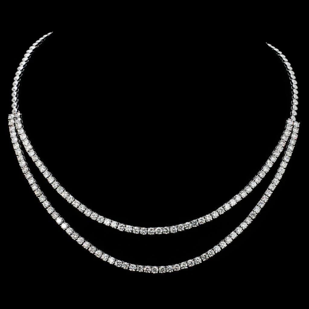 18KT FANCY GORGEOUS DOUBLE STRAND DIAMOND NECKLACE: 18KT FANCY GORGEOUS DOUBLE STRAND DIAMOND NECKLACE The Following Item we are offering is this Rare Important Radiant 18KT Gold Gorgeous Glittering and Sparkling Magnificent Fancy Double Strand Diamond