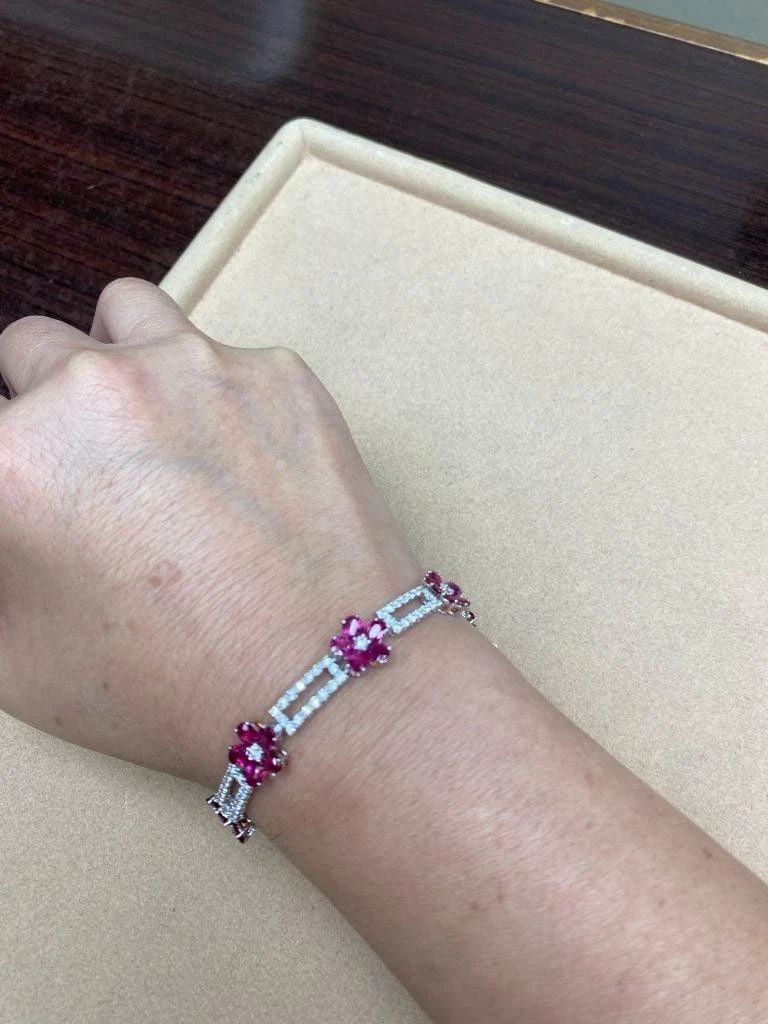 18KT GOLD FANCY GLITTERING RUBY DIAMOND FLOWER BRACELET (1 of 2)