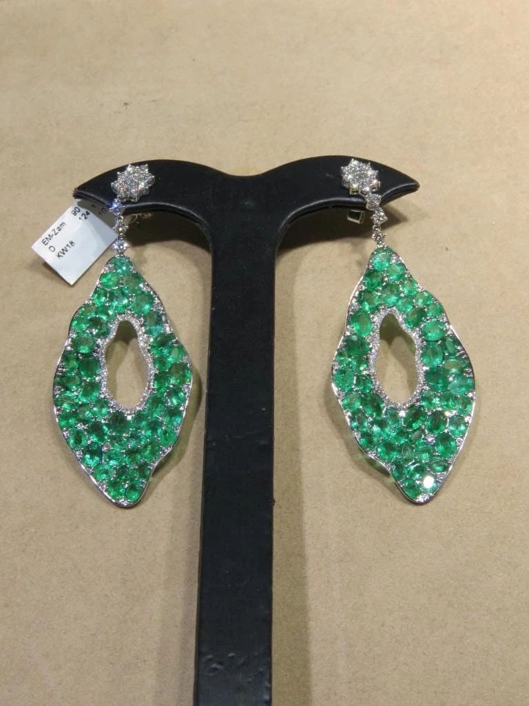 18KT GOLD FANCY BLUE AMAZONITE DIAMOND EARRINGS: 18KT GOLD FANCY BLUE AMAZONITE DIAMOND EARRINGS The Following Item we are offering are these Extremely Rare Beautiful 18KT Gold Fine Large Fancy Emerald Diamond Dangle Earrings. Each Earring features