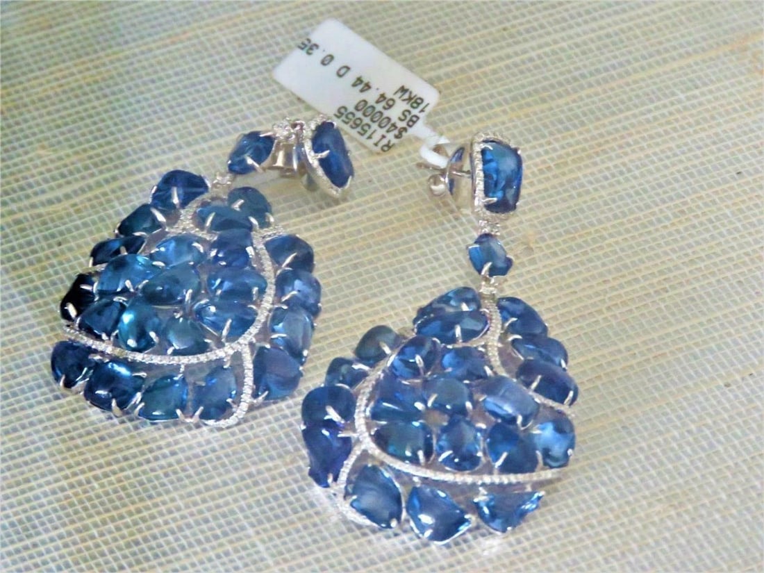 18KT GOLD 65CT RARE GORGEOUS BLUE SAPPHIRE CABOCHO EARRINGS: 18KT GOLD 65CT RARE GORGEOUS BLUE SAPPHIRE CABOCHO EARRINGS The Following Items we are offering is a Rare Important Radiant Pair of 18KT Gold Glistening Magnificent Gorgeous Rare Blue Sapphire Cabocho