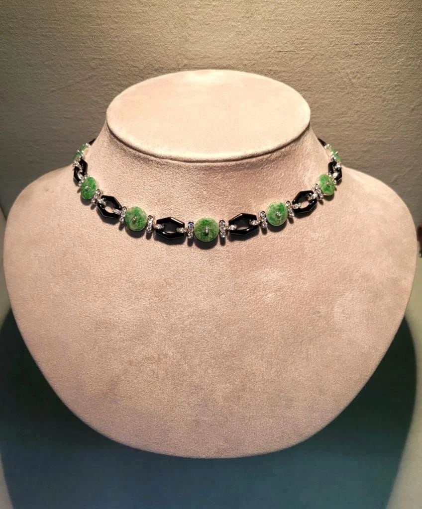 18KT GLITTERING FANCY BURMESE JADE ONYX DIAMOND NECKLACE: 18KT GLITTERING FANCY BURMESE JADE ONYX DIAMOND NECKLACE The Following Item we are offering is a Rare Magnificent Radiant 18KT Gold Large Rare Gorgeous Fancy Burmese Jade Diamond Necklace. Necklace is