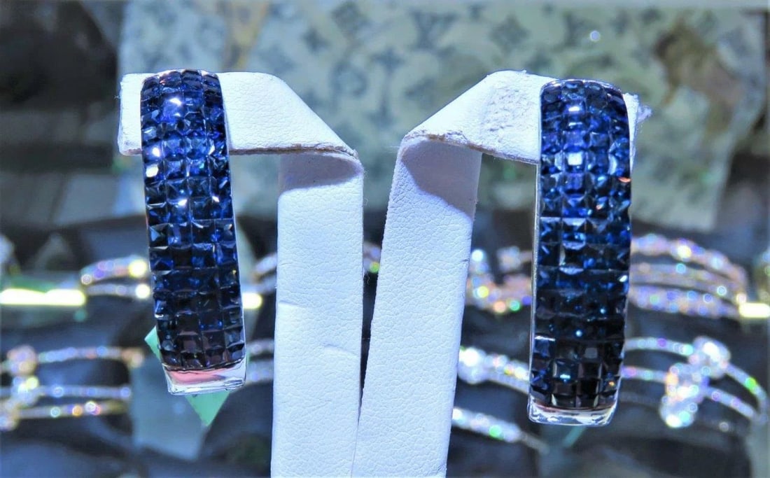 18KT 16.50CT FANCY LARGE SAPPHIRE DIAMOND HOOP EARRIINGS: 18KT 16.50CT FANCY LARGE SAPPHIRE DIAMOND HOOP EARRIINGS The Following Items we are offering is a Important Rare Pair of Magnificent 18KT Gold Fancy Emerald Cut Blue Sapphires and Diamond Hoop Earring