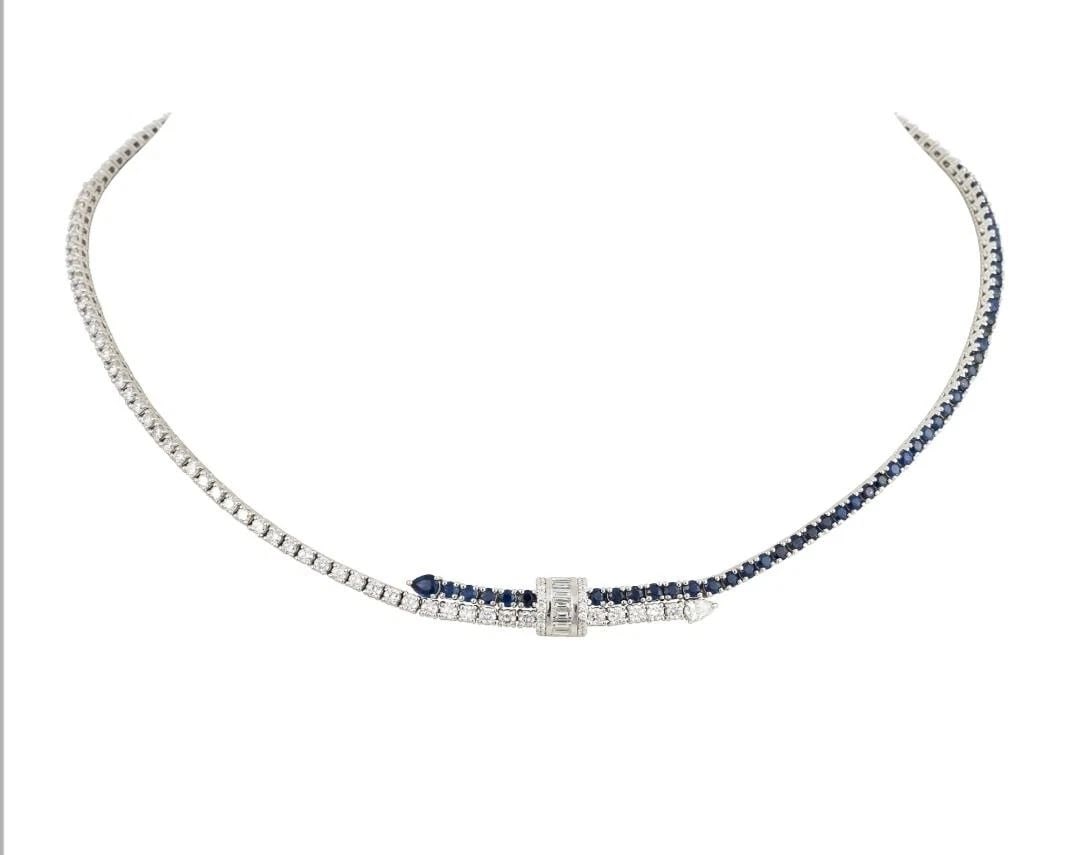18KT GOLD MAGNIFICENT BLUE SAPPHIRE DIAMOND NECKLACE: 18KT GOLD MAGNIFICENT BLUE SAPPHIRE DIAMOND NECKLACE Following N SALE!!! The Following Item we are offering is a Rare 18KT White Gold Blue Sapphire Diamond Necklace. Necklace is comprised of Finely Se