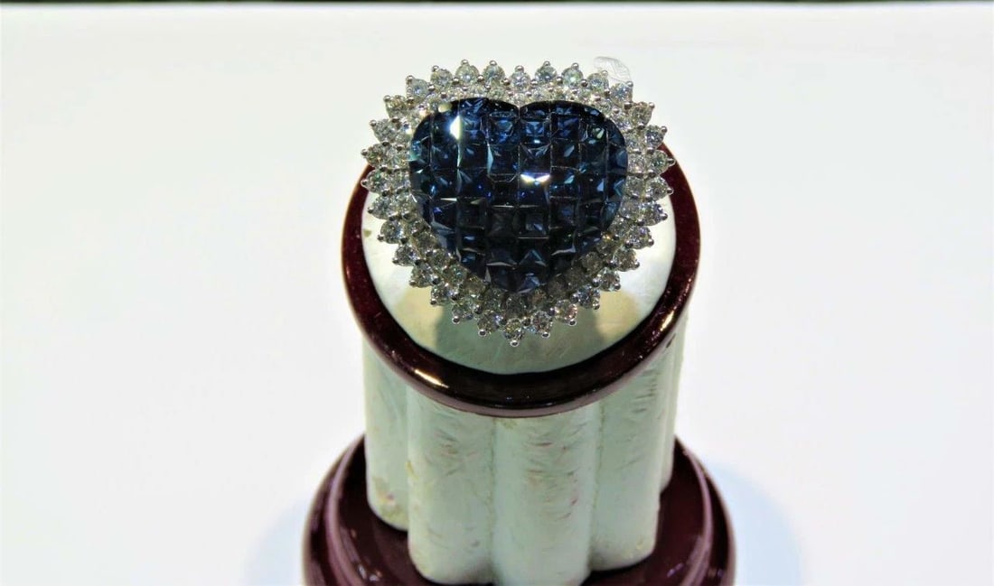 18KT 12.60CT GORGEOUS FANCY SAPPHIRE DIAMOND HEART RING: 18KT 12.60CT GORGEOUS FANCY SAPPHIRE DIAMOND HEART RING The Following Items we are offering is a Important Rare 18KT Gold Gorgeous LARGE Heart Shaped Fancy Blue Sapphire and Diamond Ring. Stones are G