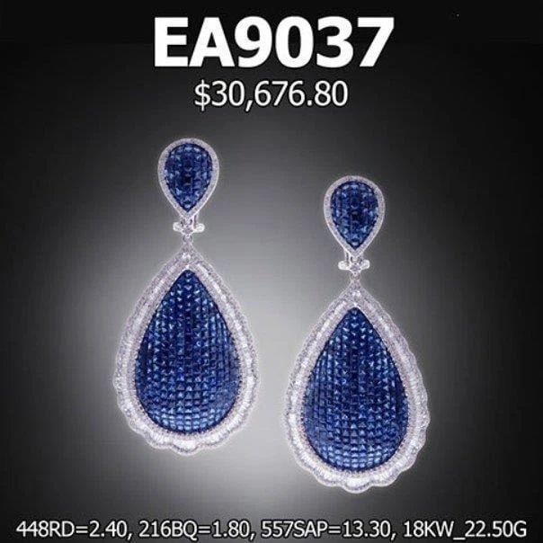 18KT LARGE SAPPHIRE DIAMOND DANGLE EARRINGS: 18KT LARGE SAPPHIRE DIAMOND DANGLE EARRINGS 18KT LARGE SAPPHIRE DIAMOND DANGLE EARRINGS The Following Item we are offering is this Beautiful Rare Important 18KT White Gold Fancy Blue Sapphire and Diam