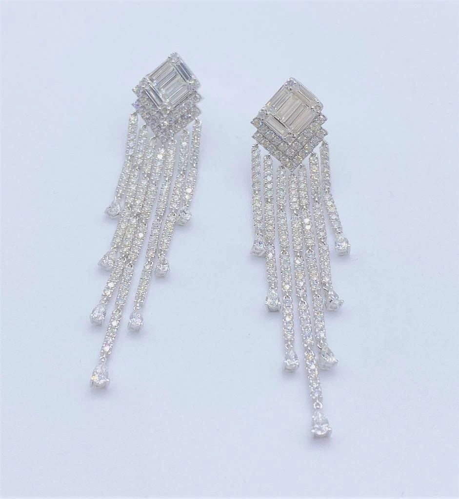 18KT 6.50CT LG FANCY BAGUETTE DIAMOND DANGLE EARRINGS: 18KT 6.50CT LG FANCY BAGUETTE DIAMOND DANGLE EARRINGS The Following Items we are offering is a Rare Important Radiant 18KT White Gold Elaborate Design, in the style of Winston, Magnificent Rare Large
