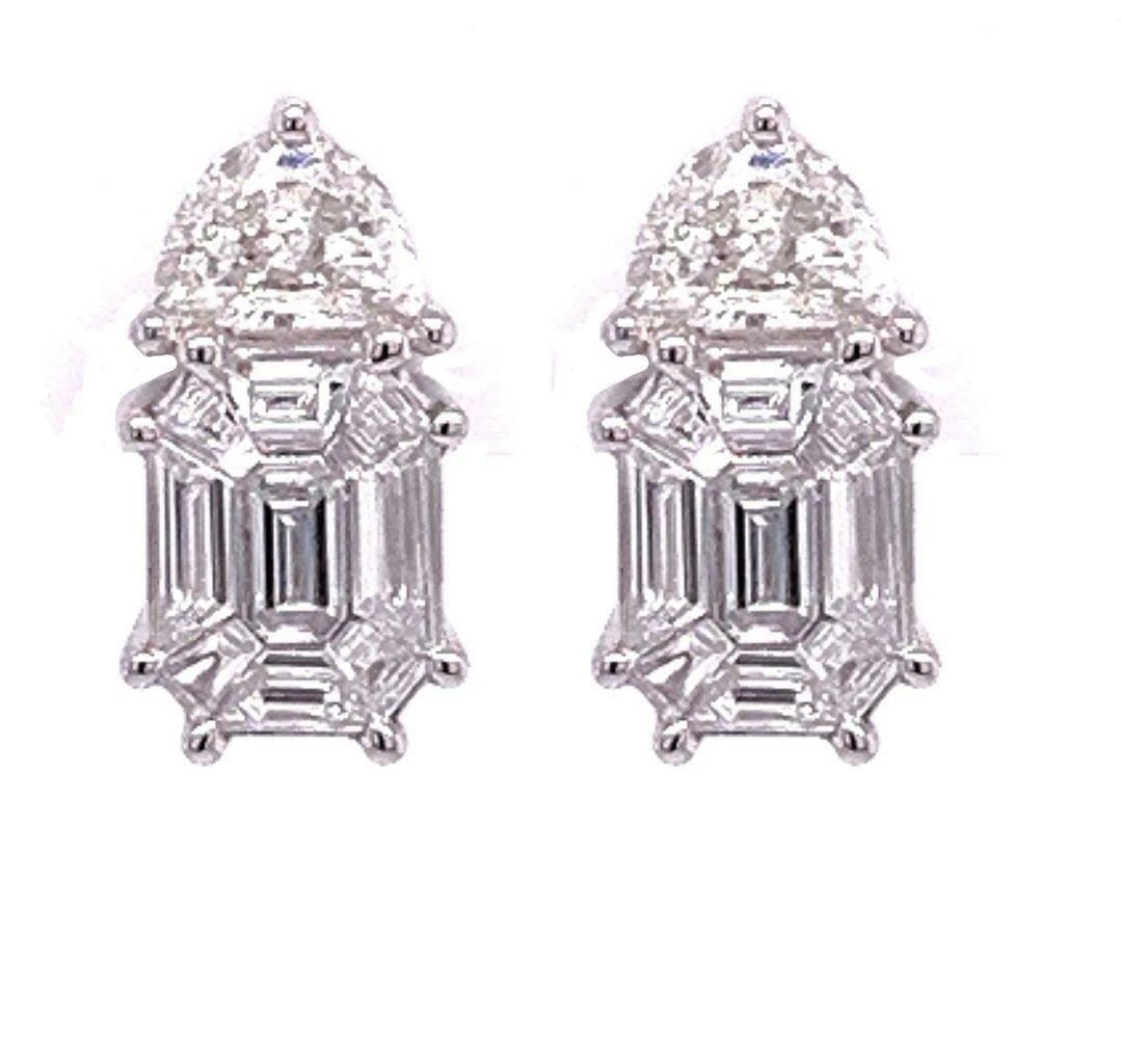 18KT LRG DIAMOND BAGUETTE STUD EARRINGS: 18KT LRG DIAMOND BAGUETTE STUD EARRINGS The Following Item we are offering are these Beautiful Important Rare 18KT Gold Brilliant Large Rare Fancy Diamond Stud Baguette Earrings. Each Earring is Exqui