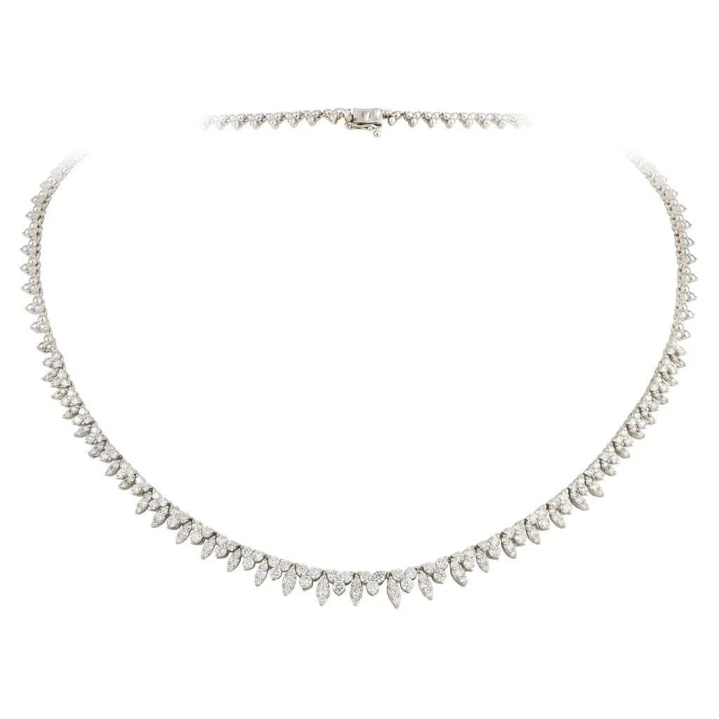 18KT GOLD IMPORTANT GORGEOUS FANCY DIAMOND FRINGE NECKLACE: Description LAST CALL, LAST CHANCE!!! LIQUIDATION SALE!!! The Following Item we are offering is a Rare Important Estate Winston Style Radiant 18KT White Gold Gorgeous Diamond Fringe Necklace consistin