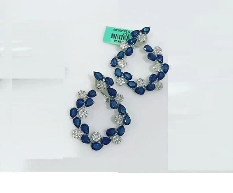 18KT LRG SAPPHIRE DIAMOND GOLD FLORAL EARRINGS: 18KT LRG SAPPHIRE DIAMOND GOLD FLORAL EARRINGS 18KT LRG SAPPHIRE DIAMOND GOLD FLORAL EARRINGS The Following Items we are offering is a Rare Important Pair of Winston Style 18KT White Gold Large Blue S