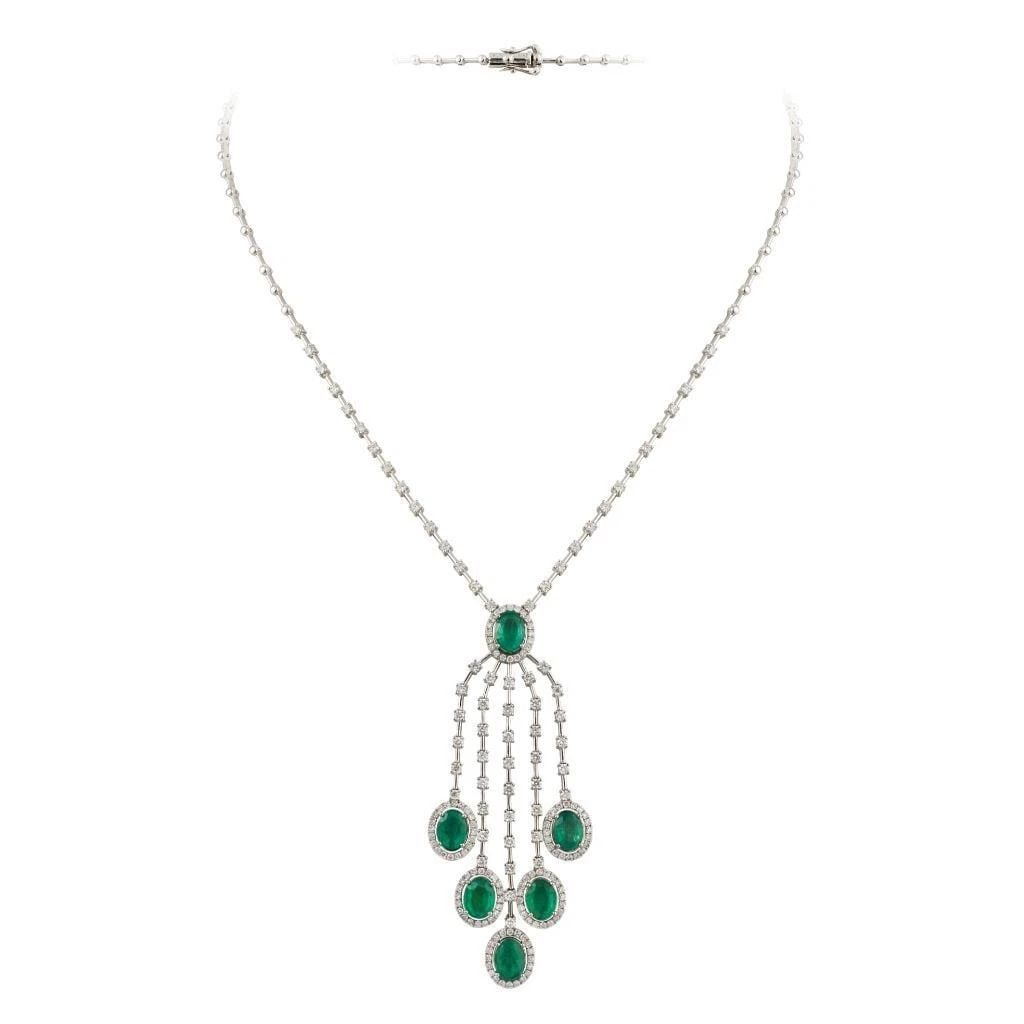 18KT GOLD GORGEOUS FANCY EMERALD DIAMOND DROP NECKLACE: 18KT GOLD GORGEOUS FANCY EMERALD DIAMOND DROP NECKLACE A Rare 18KT White Gold Emerald Diamond Necklace. Necklace is comprised of Finely Set Glittering Gorgeous Emerald Drop Necklace adorned with Spark