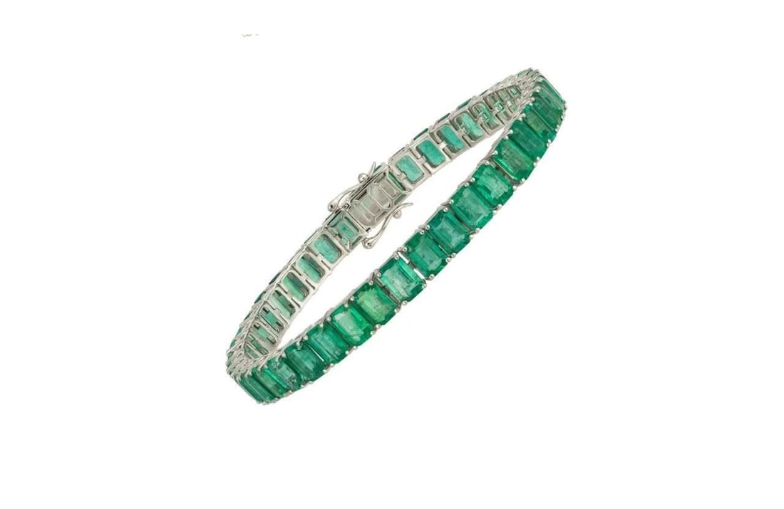 18KT GOLD FANCY GORGEOUS 24CT EMERALD TENNIS BRACELET (1 of 2)