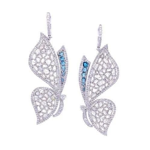 18KT RARE SLICED BLUE DIAMOND WHITE BUTTERFLY EARRINGS: 18KT RARE SLICED BLUE DIAMOND WHITE BUTTERFLY EARRINGS The Following Items we are offering is a Rare Important Radiant Pair of 18KT White Gold Gorgeous Glittering Butterfly Diamond Earrings Featuring