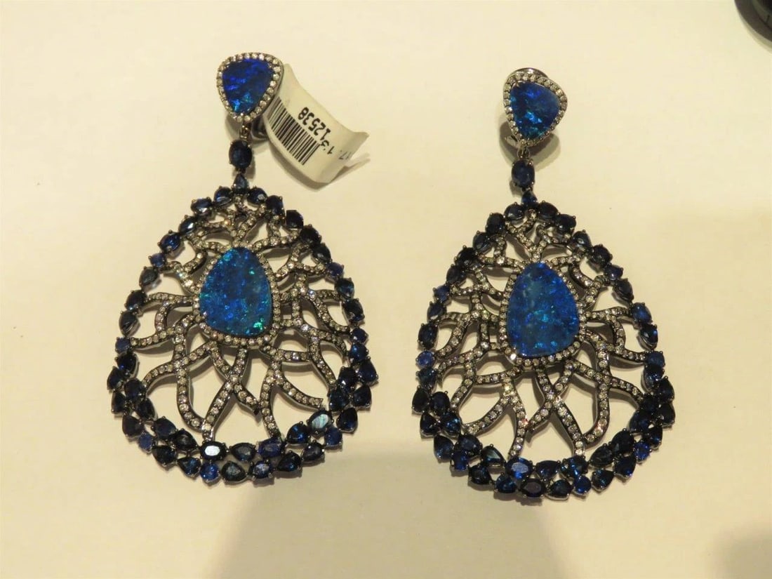 18KT GOLD 33CT LRG AUSTRALIAN BLACK OPAL SAPPHIRE EARRINGS: 18KT GOLD 33CT LRG AUSTRALIAN BLACK OPAL SAPPHIRE EARRINGS The Following Items we are offering is a Rare Important Spectacular and Brilliant 18KT Gold Large Gorgeous Black Opal Blue Sapphire and Diamo