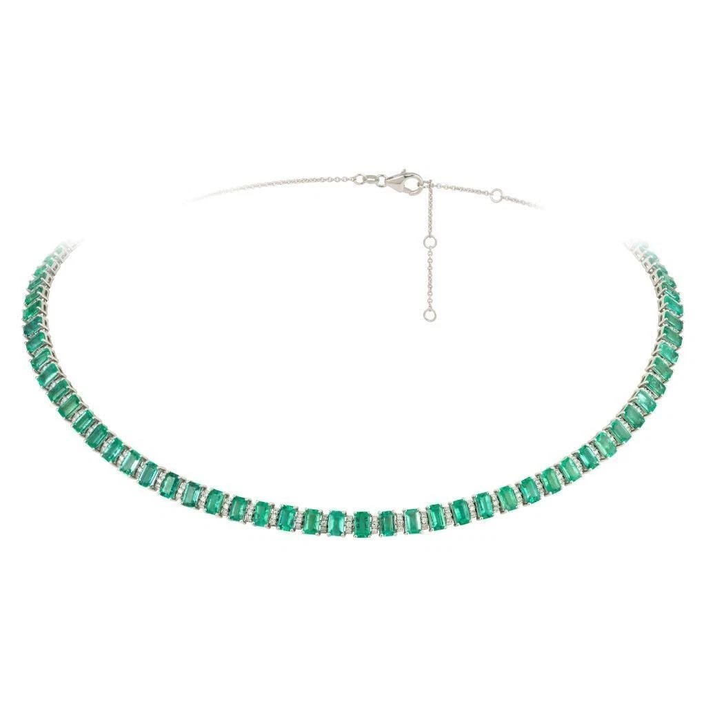 18KT FANCY GORGEOUS EMERALD DIAMOND STRAND NECKLACE: 18KT FANCY GORGEOUS EMERALD DIAMOND STRAND NECKLACE The Following Items we are offering is this Rare Important Radiant 18KT Gold Gorgeous Glittering and Sparkling Magnificent Fancy Emerald Cut Emerald