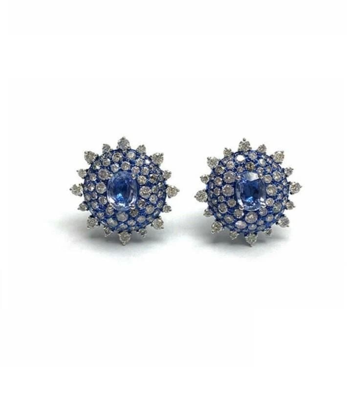 18KT GOLD CEYLON SAPPHIRE DIAMOND EARRINGS: 18KT GOLD CEYLON SAPPHIRE DIAMOND EARRINGS The Following Items we are offering is a Gorgeous Pair of Radiant 18KT White Gold Rare Ceylon Blue Sapphire and Brilliant White Diamond Earrings. Earrings ar