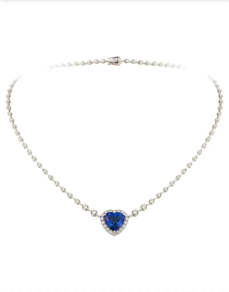18KT GOLD GORGEOUS FANCY HEART TANZANITE DIAMOND NECKLACE: 18KT GOLD GORGEOUS FANCY HEART TANZANITE DIAMOND NECKLACE The Following Item we are offering is a Rare Important Spectacular and Brilliant 18KT Gold Large Gorgeous Graduated Tanzanite Heart Diamond Ne