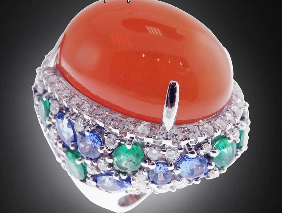 18KT HUGE OPAL EMERALD TANAZANITE DIAMOND RING: 18KT HUGE OPAL EMERALD TANAZANITE DIAMOND RING 18KT HUGE OPAL EMERALD TANAZANITE DIAMOND RING The Following Item we are offering is this Beautiful 18KT White Gold HUGE Orange Opal, Emerald, Tanzanite